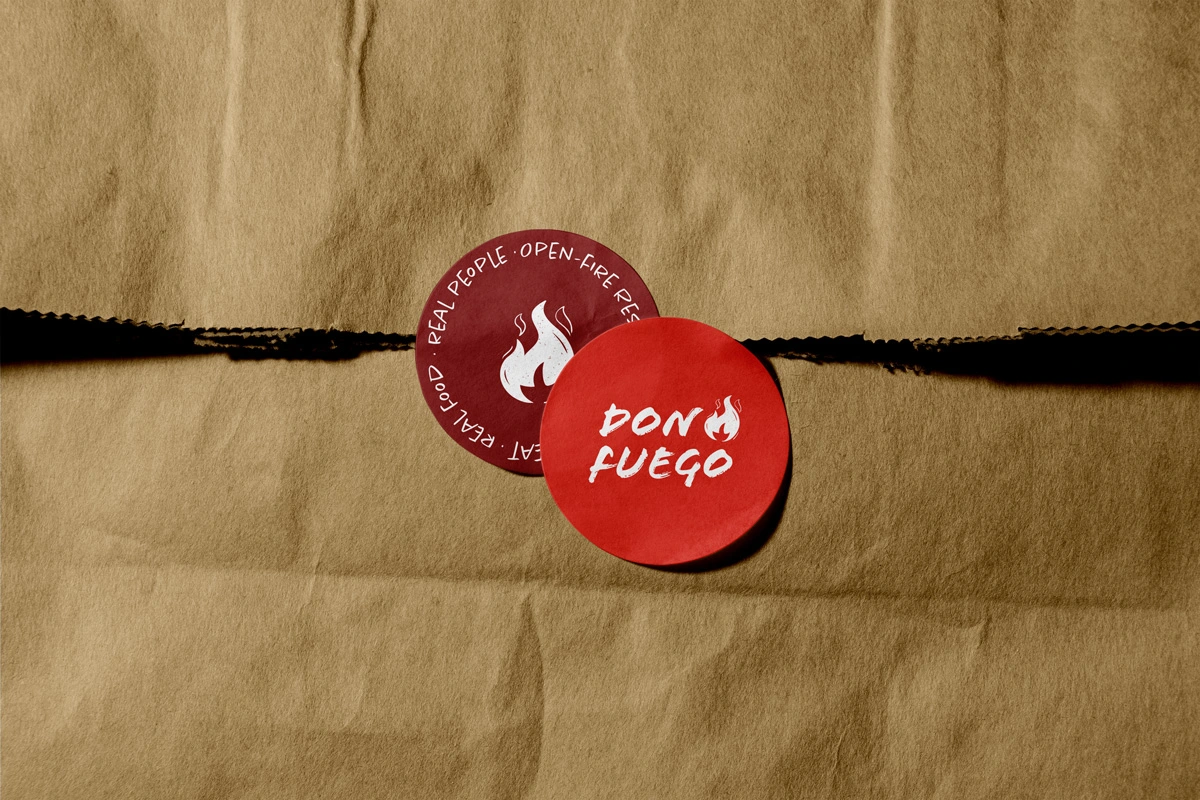 Création logo restaurant Don Fuego, cuisine au feu de bois, lieu convivial